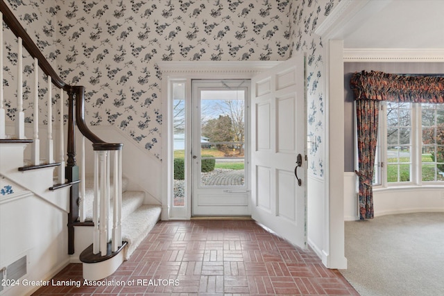 entrance foyer featuring a healthy amount of sunlight