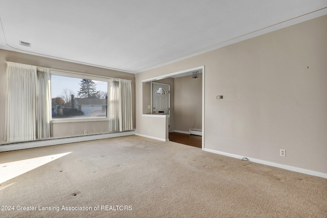 carpeted spare room featuring a baseboard radiator and ornamental molding