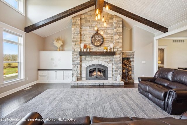 living room with beam ceiling, dark hardwood / wood-style flooring, high vaulted ceiling, and a stone fireplace