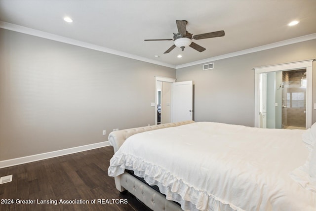 bedroom with ceiling fan, dark hardwood / wood-style floors, and ornamental molding