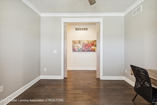 office area featuring dark hardwood / wood-style flooring and crown molding