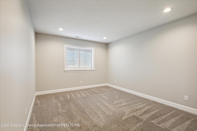 unfurnished room featuring carpet floors