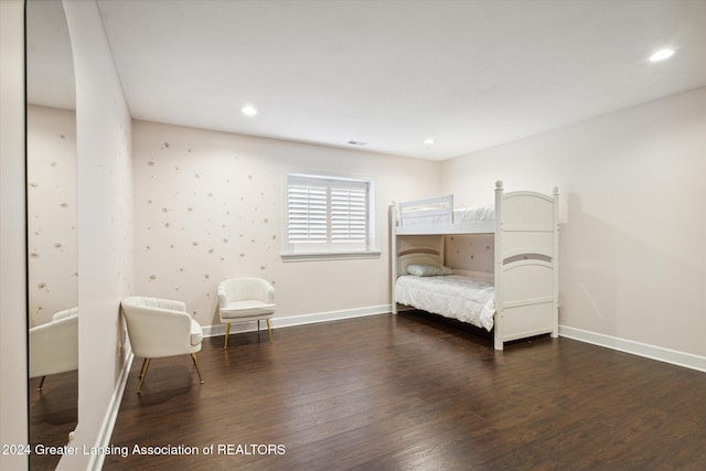 unfurnished bedroom featuring dark hardwood / wood-style flooring