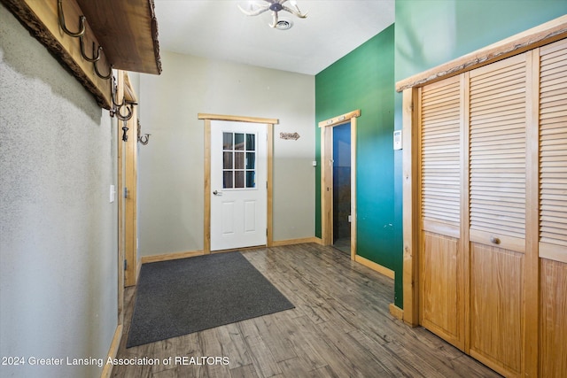 doorway with hardwood / wood-style floors