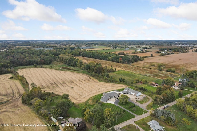 birds eye view of property featuring a rural view