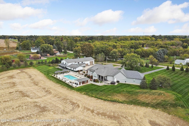 birds eye view of property featuring a rural view