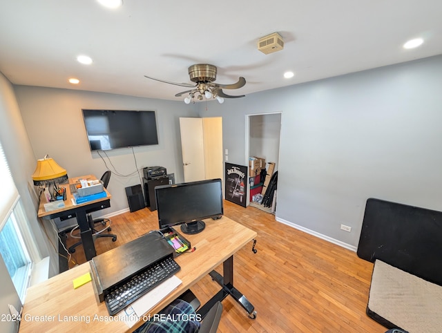 office space with ceiling fan and wood-type flooring