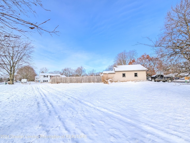 view of yard covered in snow