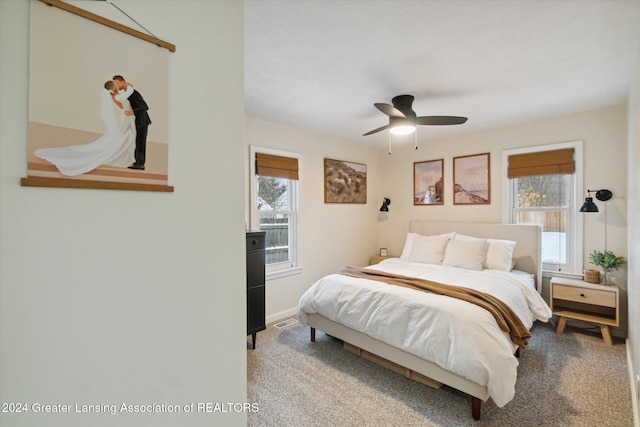 carpeted bedroom featuring ceiling fan