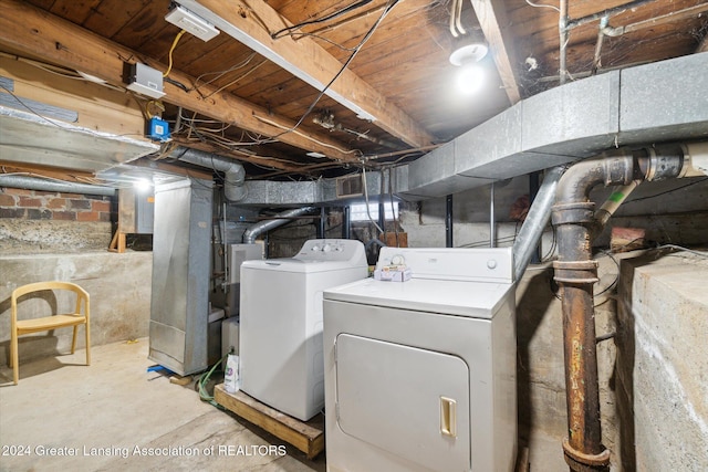 basement featuring washer and dryer