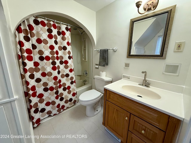 full bathroom with shower / tub combo, vanity, and toilet