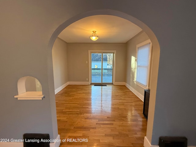 spare room with light hardwood / wood-style floors