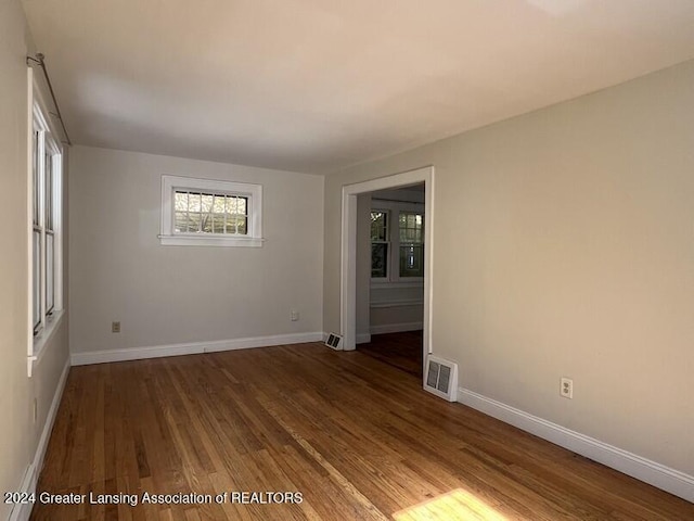 empty room featuring hardwood / wood-style floors