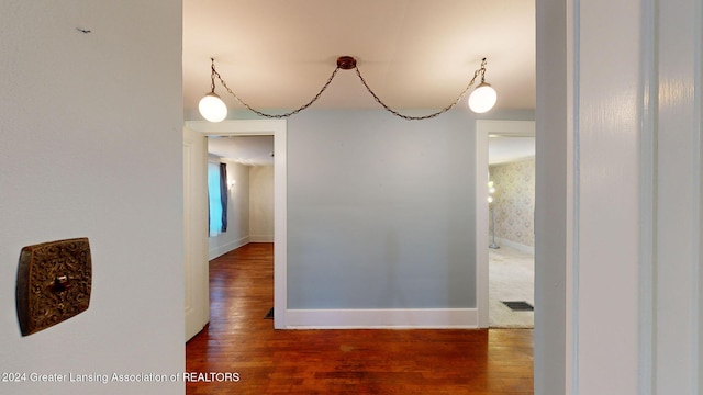 dining room with dark wood-type flooring