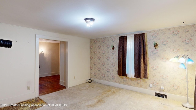 empty room with carpet floors