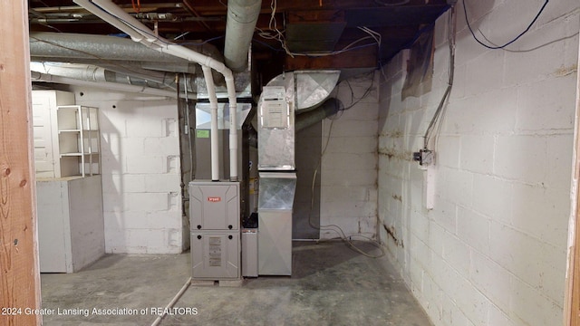 basement featuring heating unit