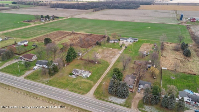 birds eye view of property featuring a rural view