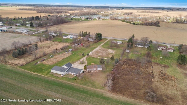 birds eye view of property featuring a rural view