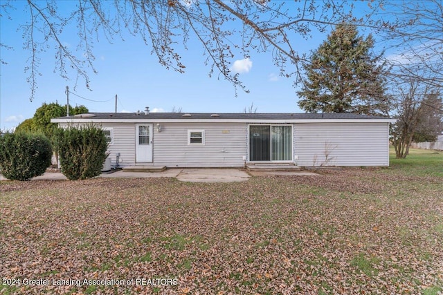 back of house with a patio area