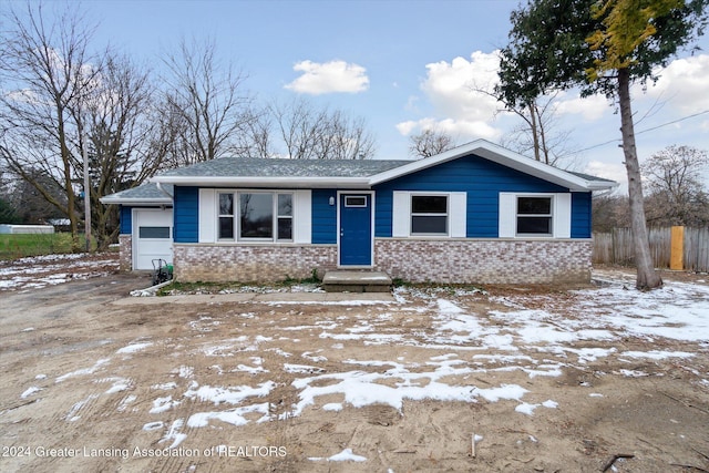 view of front of home featuring a garage