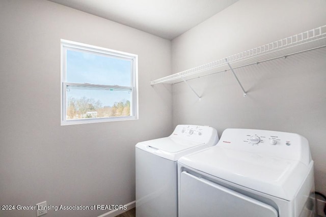 laundry room featuring separate washer and dryer