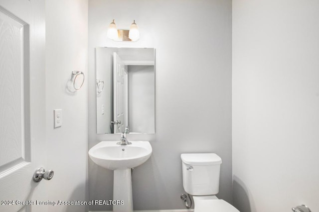 bathroom featuring toilet