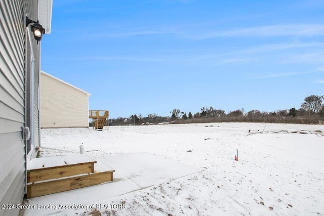 view of snowy yard