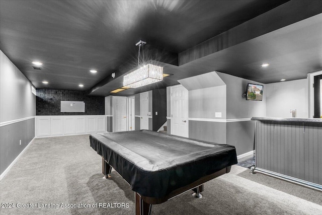 recreation room featuring bar, light carpet, and pool table