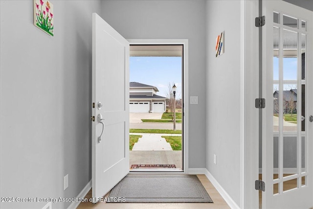 entrance foyer featuring a healthy amount of sunlight and light wood-type flooring