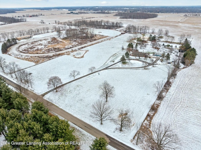 snowy aerial view with a rural view