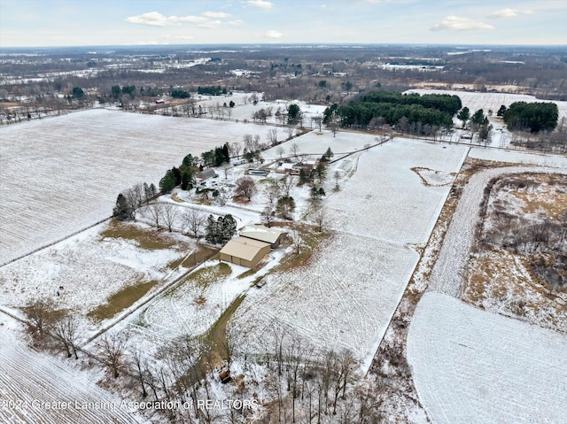 snowy aerial view with a rural view