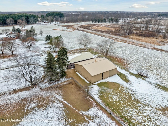 snowy aerial view with a rural view