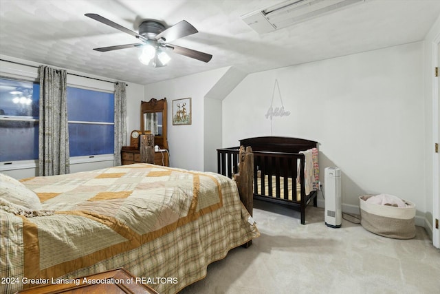 carpeted bedroom with ceiling fan