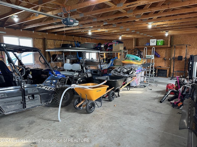 garage featuring a garage door opener