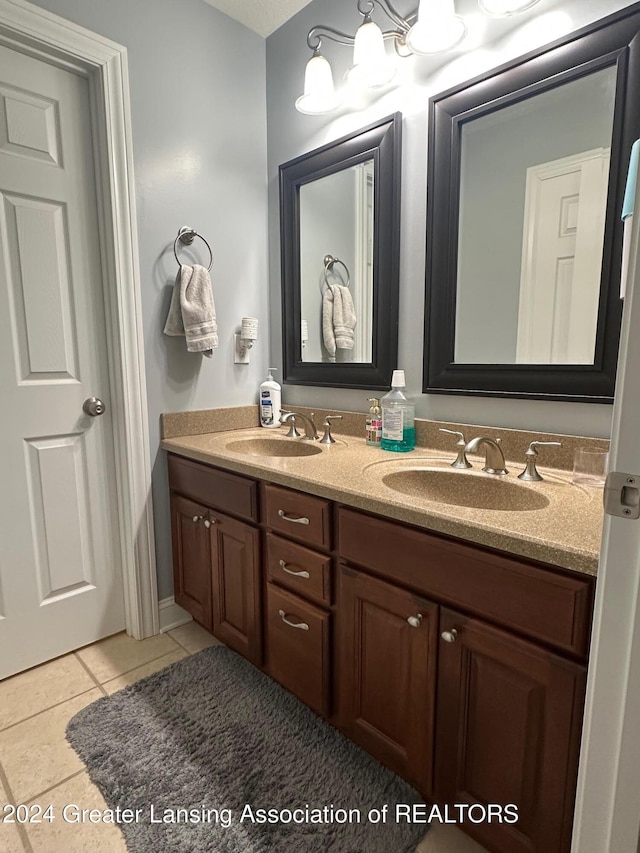 bathroom with vanity and tile patterned floors