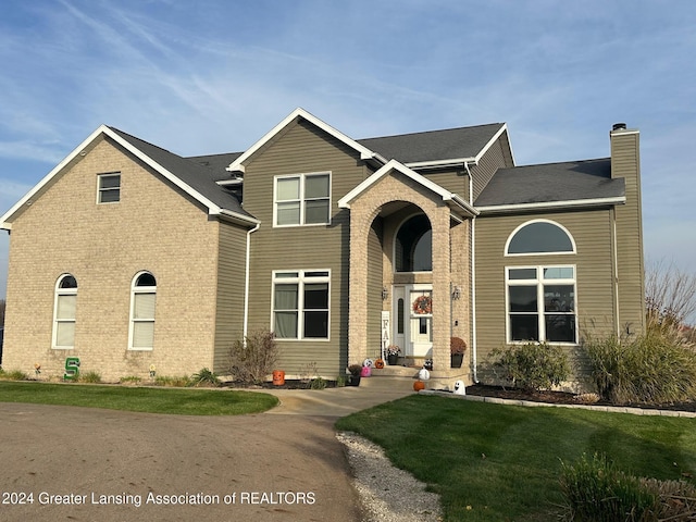 view of front property with a front yard