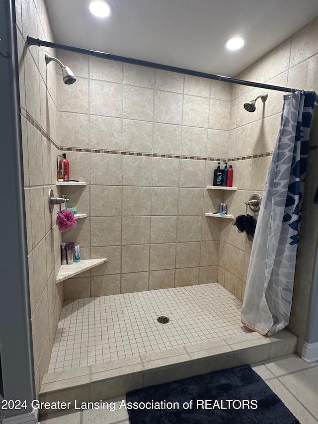 bathroom featuring walk in shower