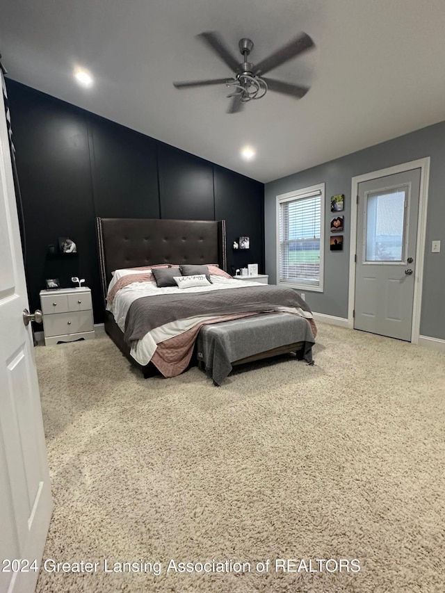 carpeted bedroom featuring ceiling fan