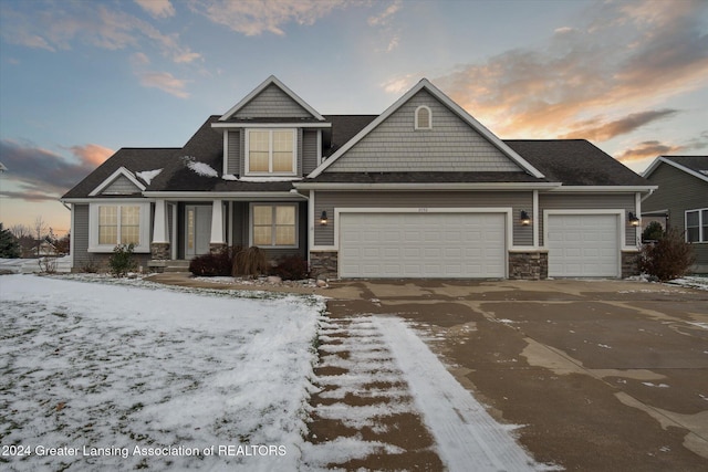 craftsman house featuring a garage