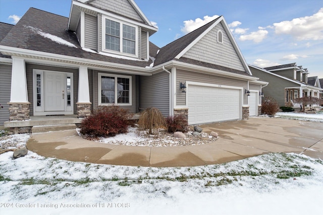 craftsman house with a garage