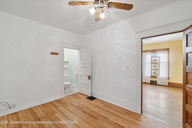 spare room featuring ceiling fan and light hardwood / wood-style floors