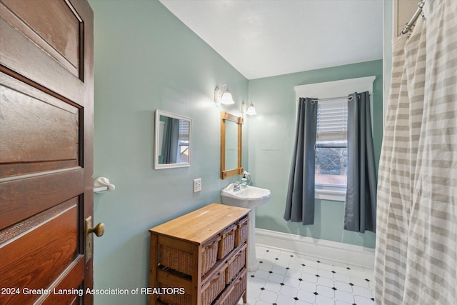 bathroom featuring walk in shower