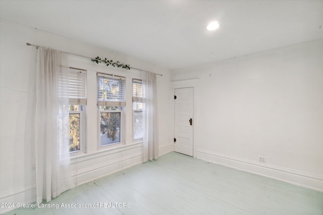 empty room featuring wood-type flooring