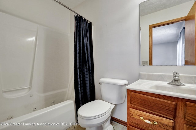 full bathroom with shower / bath combo, vanity, and toilet