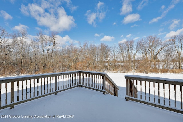 view of snow covered deck