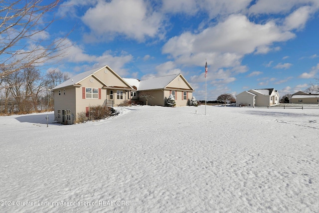 view of snow covered property