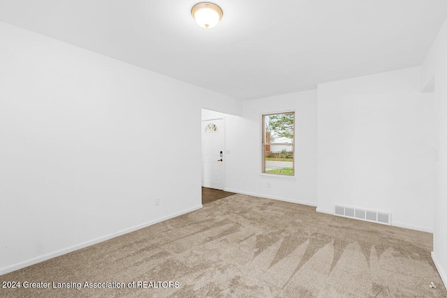 spare room with carpet flooring