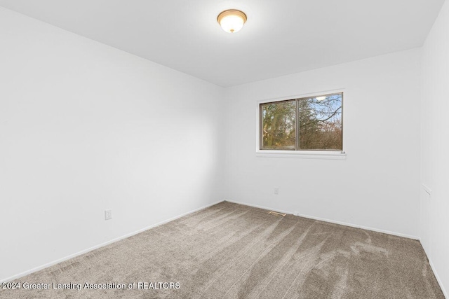 empty room with carpet floors