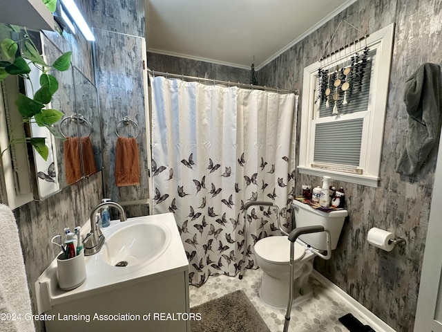 bathroom with a shower with curtain, toilet, crown molding, and vanity