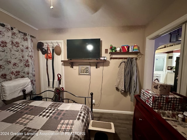 bedroom featuring dark wood-type flooring